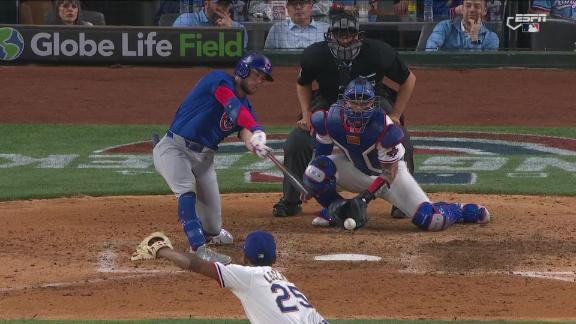 Cubs take lead after controversial call at the plate