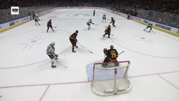 West-leading Stars wrap up playoff spot, beating Canucks 3-1 for 6th straight victory