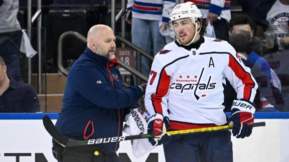 T.J. Oshie leaves game after huge hit from Artemi Panarin