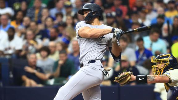 Carlos Rod  n pitches 6 strong innings and Yankees hit 4 homers in a 15-3 rout of Brewers