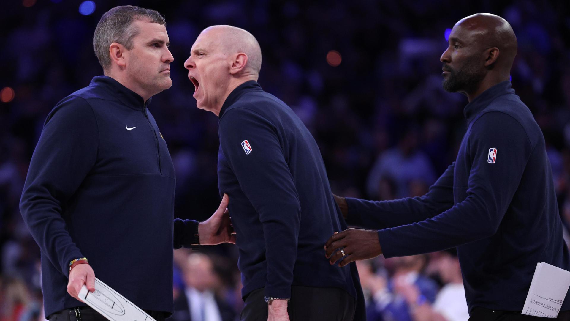 Rick Carlisle is ejected in the fourth quarter for clapping in the face of NBA official Marc Davis.