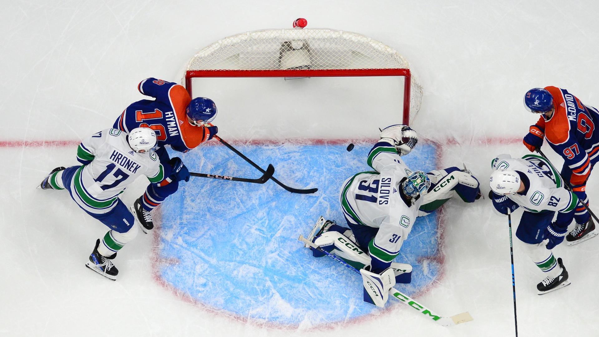 Bouchard scores late winner  Oilers edge Canucks 3-2 to tie playoff series at 2 games apiece