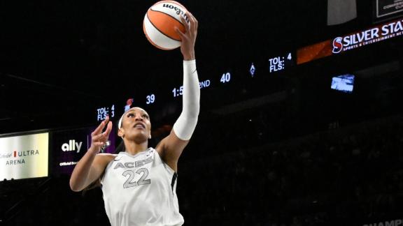 Wilson's double-double leads 2-time champion Aces past Mercury 89-80 in season opener