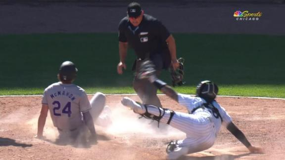 Rockies take lead in the 14th on bang-bang play at the plate