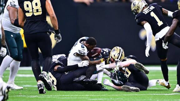 DeVonta Smith heads to the medical tent after taking huge hit vs. Saints