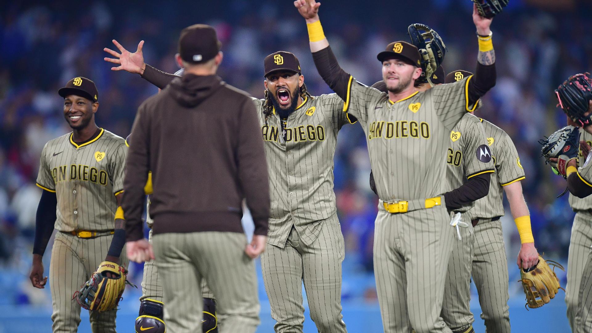 Padres clinch postseason berth with 4-2 win over NL West-leading Dodgers in opener of crucial series