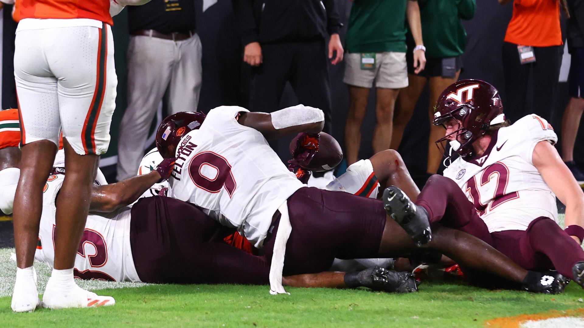 No  7 Miami survives Virginia Tech 38-34 to remain unbeaten after Hail Mary TD overturned