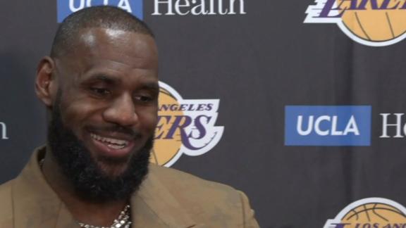 LeBron James and Bronny James reflect on making history during the Lakers' win by checking into the game as the first father-son duo to play together in the NBA.