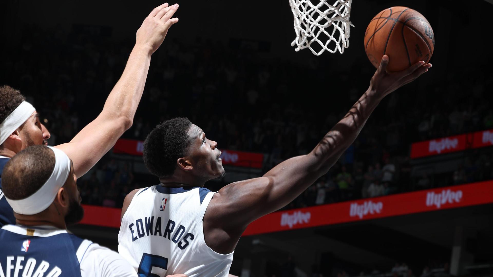 Anthony Edwards maneuvers through the Mavericks' defense gracefully as he Eurosteps himself to a bucket.
