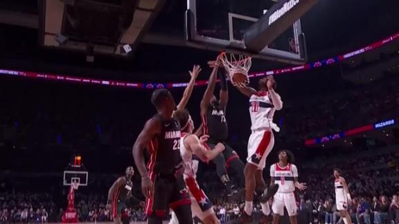 Bam Adebayo shows no mercy as he throws it down over multiple defenders to pad the Heat's lead.
