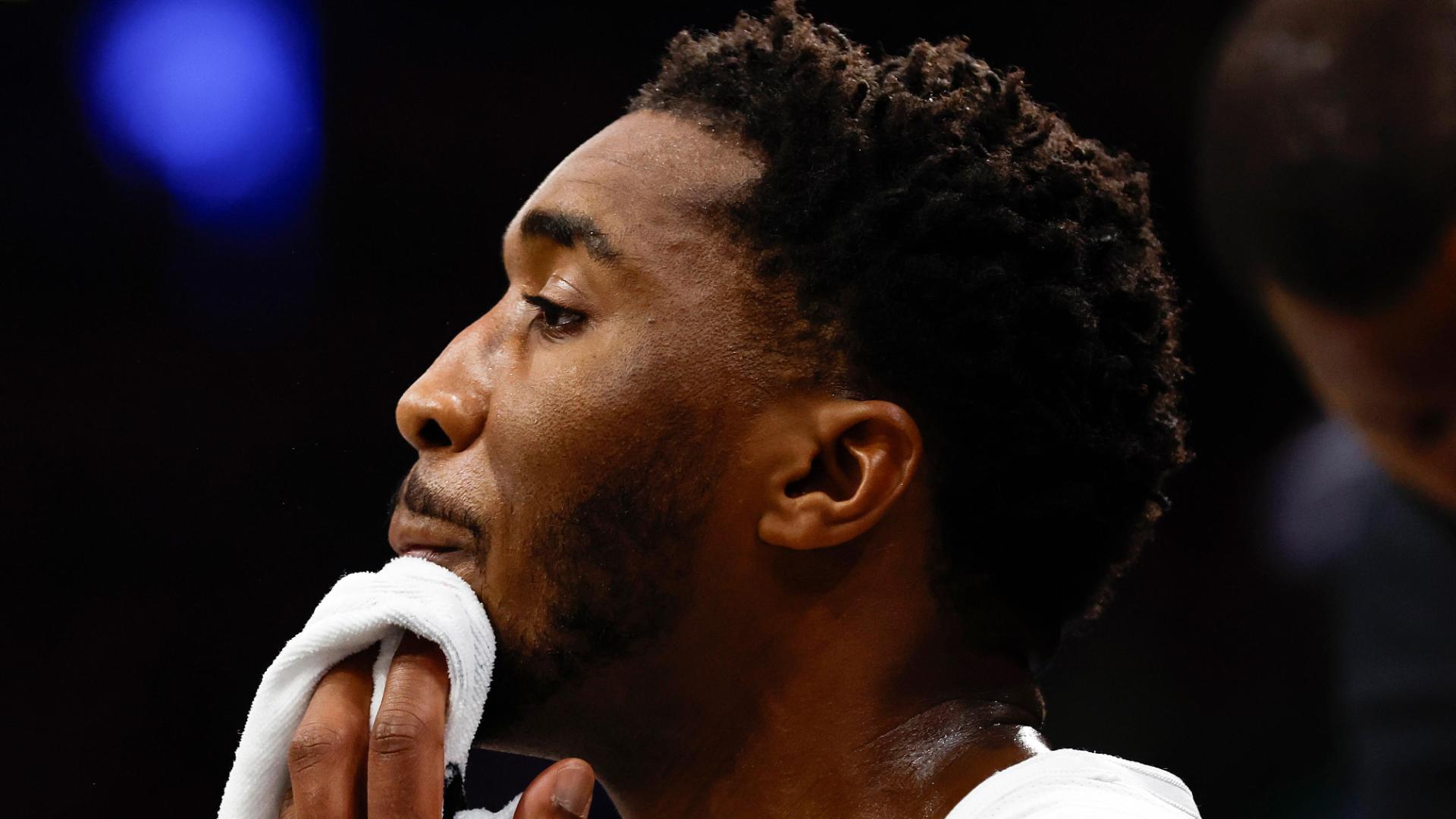 Cavaliers star Donovan Mitchell is shaken up after colliding with Jayson Tatum late against the Celtics.