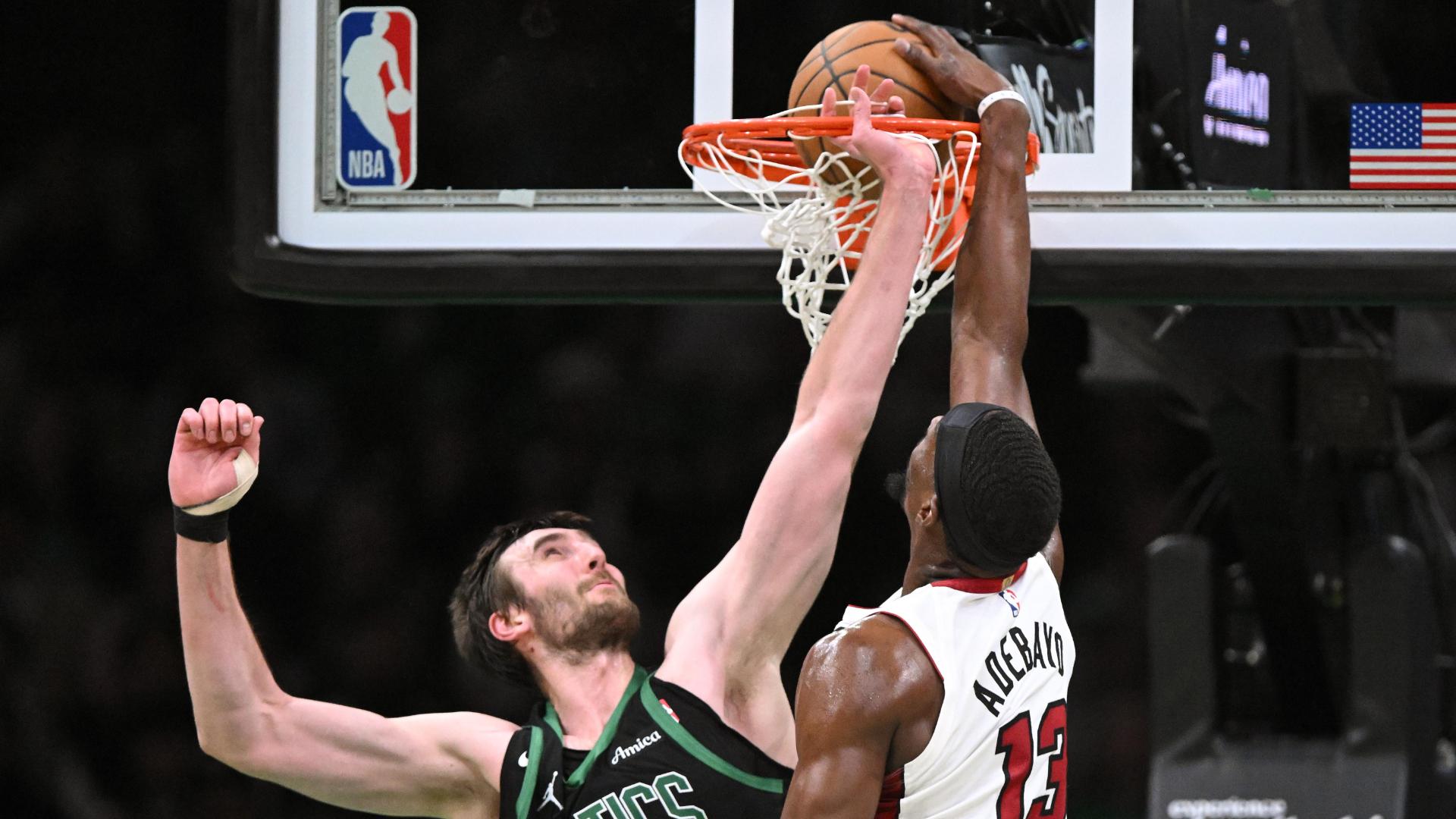 Bam Adebayo takes it right at Luke Kornet for an emphatic Heat dunk.