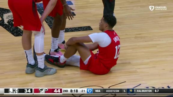 Dru Smith goes down with an apparent injury in the second quarter of the Heat's matchup against the Nets.