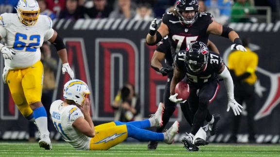 Texans intercept Herbert a career-high 4 times in a 32-12 win over Chargers  in wild-card playoff - ABC13 Houston