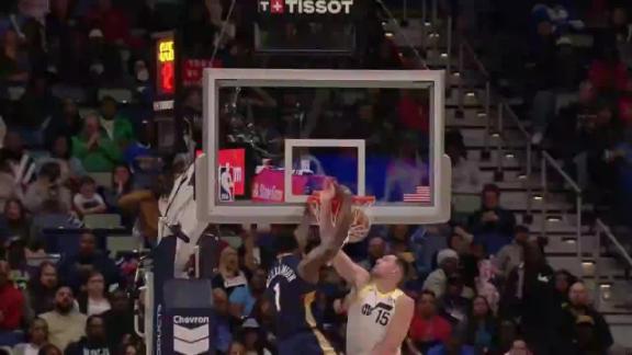 Zion Williamson gets a head of steam and throws down a huge poster slam for the Pelicans.