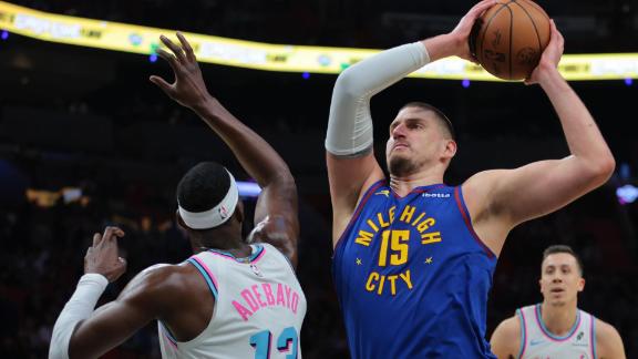 NIkola Jokic puts up 24 points with 12 rebounds and 10 assists in the Nuggets' win over the Heat.