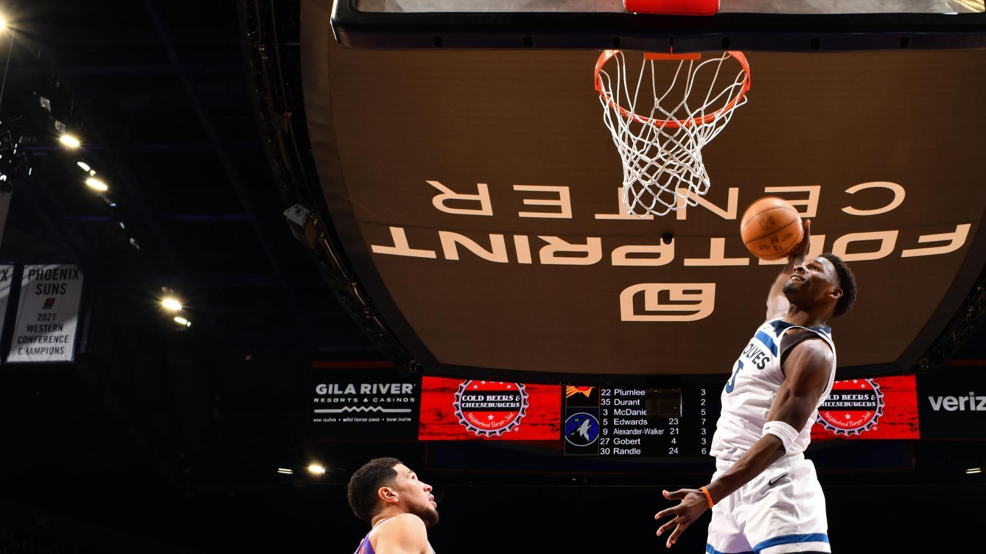 Anthony Edwards glides in for a massive one-handed dunk and lets everyone know about it afterward.