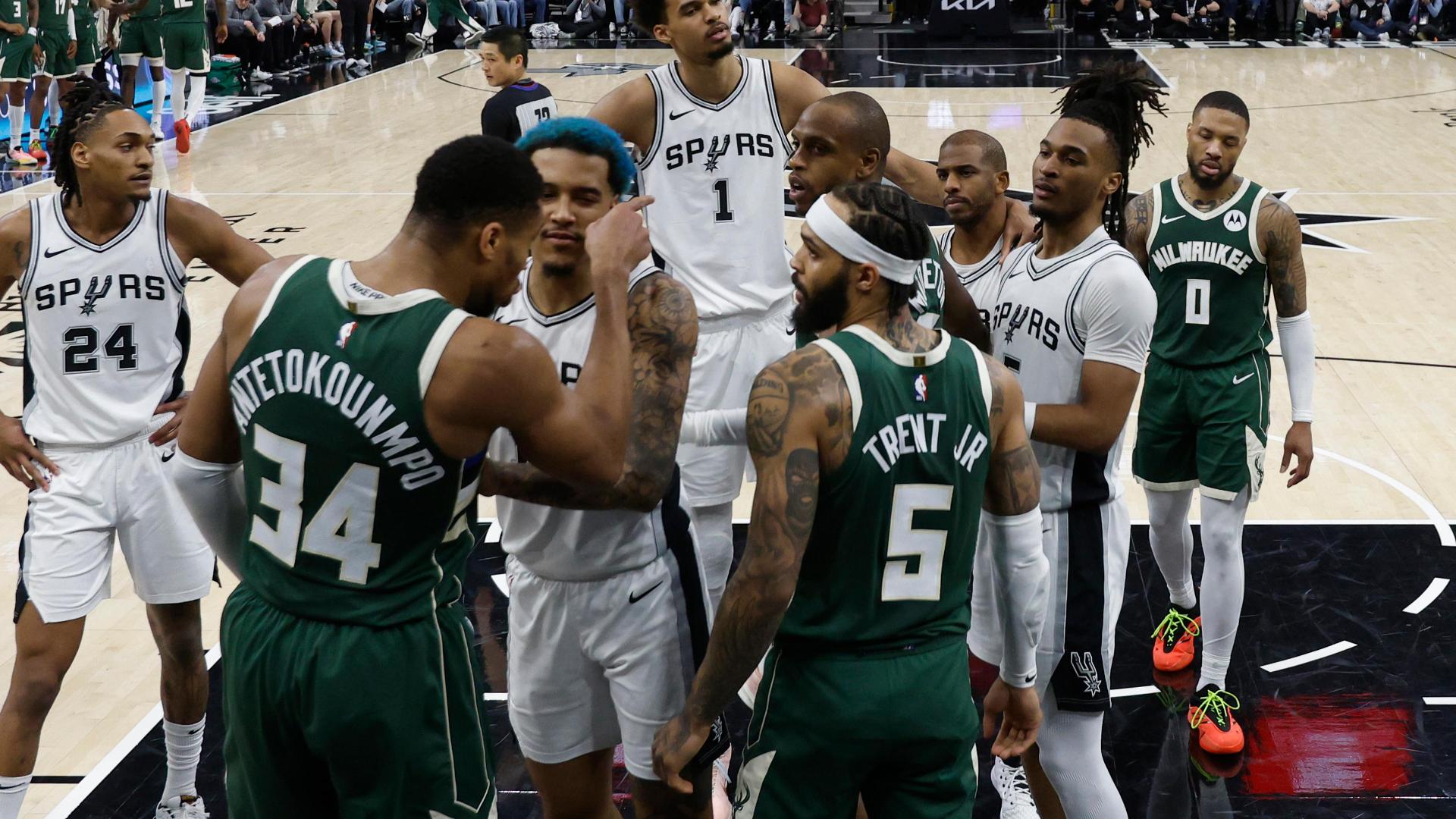 Tempers flare after Giannis Antetokounmpo takes exception to a shove from Chris Paul.
