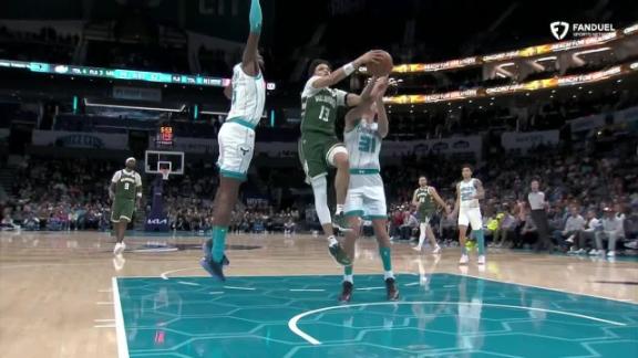 Ryan Rollins somehow gets the and-1 to fall