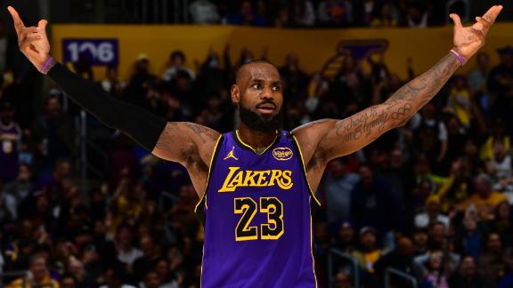 LeBron James crosses half court, pulls up from the log and drains a 3-pointer for the Lakers.
