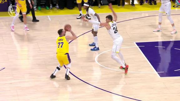 Luka Doncic pulls up from downtown and rattles in a 3-pointer for his first points as a Laker.
