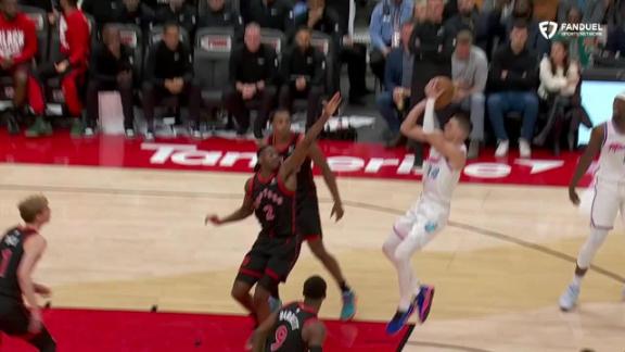 Tyler Herro knocks down an and-1 jumper as the Heat take down the Raptors in overtime.
