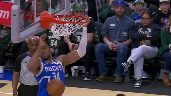 Bucks star Giannis Antetokounmpo misses his jumper, but grabs the offensive rebound and slams it home against the Heat.