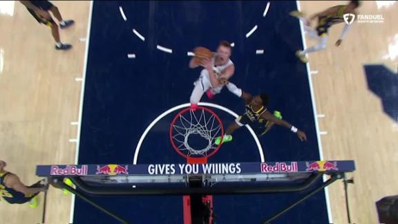 Christian Braun fights off defender for and-1