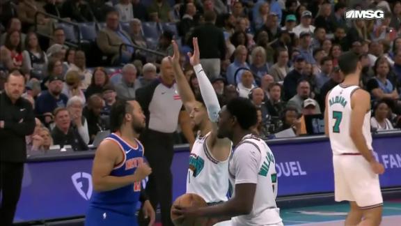 Jalen Brunson fights off defender for and-1