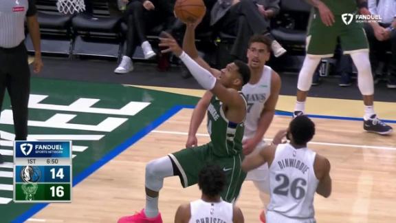 Giannis Antetokounmpo skies for big slam dunk