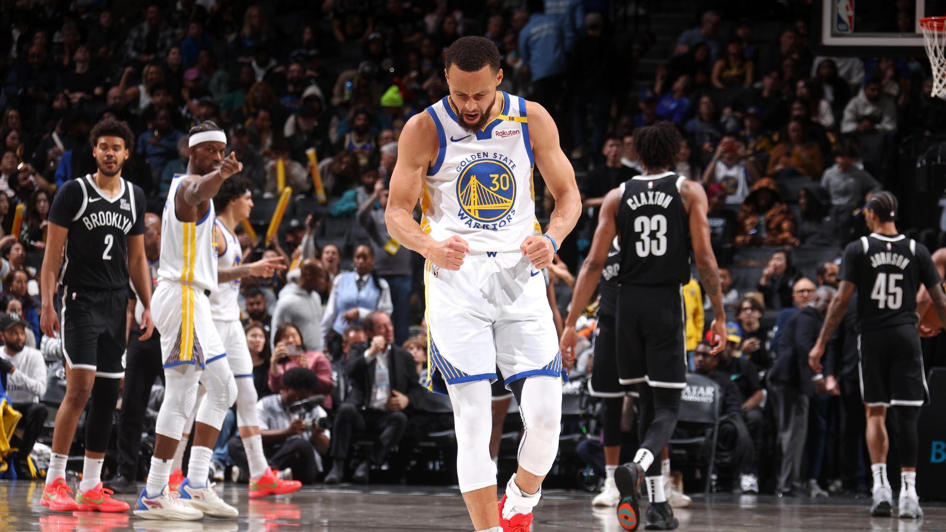 Stephen Curry sinks a ridiculous logo 3-pointer just before halftime.