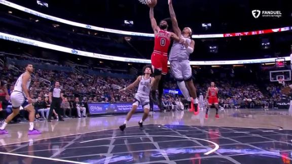 Coby White rocks the rim with slam dunk