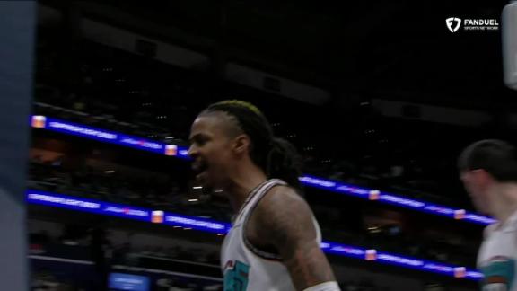 Ja Morant fights off defender for and-1