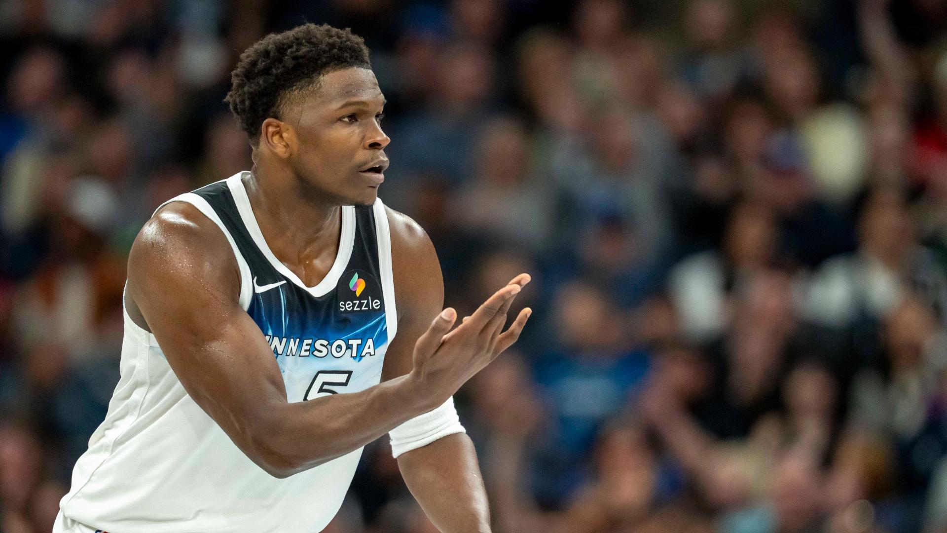 Timberwolves star Anthony Edwards drains a deep 3-pointer vs. the San Antonio Spurs