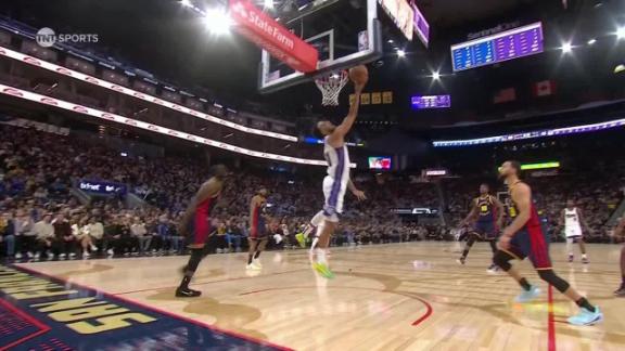 Trey Lyles finishes through contact for an and-1 off a feed from DeMar DeRozan.
