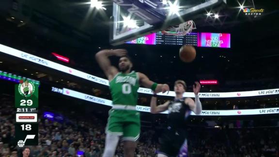 Jayson Tatum rocks the rim with dunk