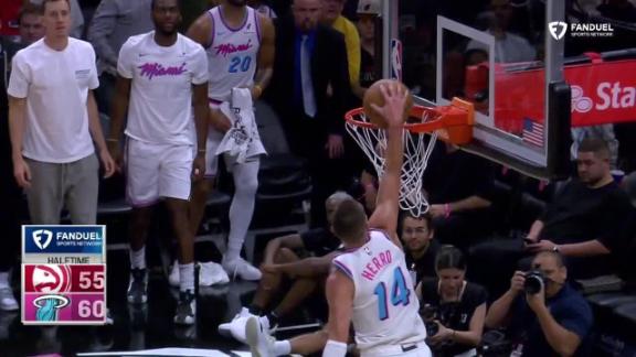 Tyler Herro rocks the rim with powerful jam