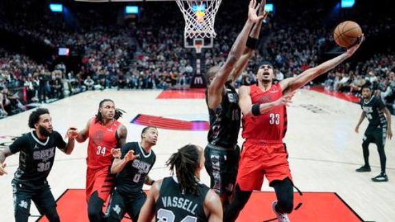 Toumani Camara had 23 points and 11 rebounds and the Portland Trail Blazers held off a late rally by the San Antonio Spurs for a 120-109 win.