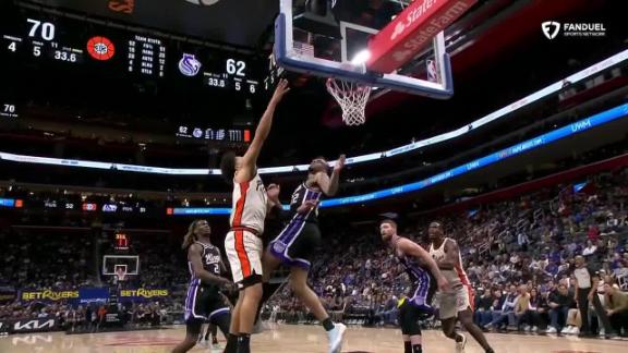 Cade Cunningham gets the and-1 to fall