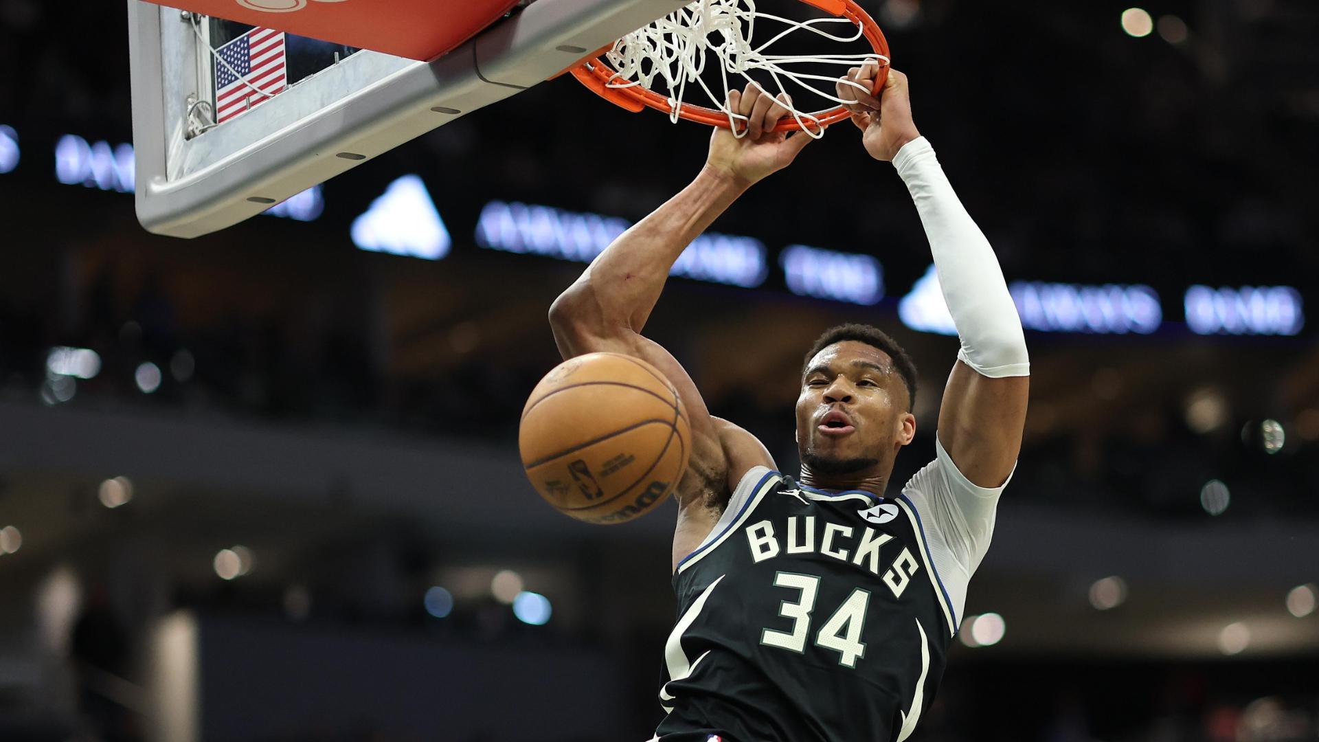 Giannis Antetokounmpo throws down an alley-oop to close the opening half for the Bucks.