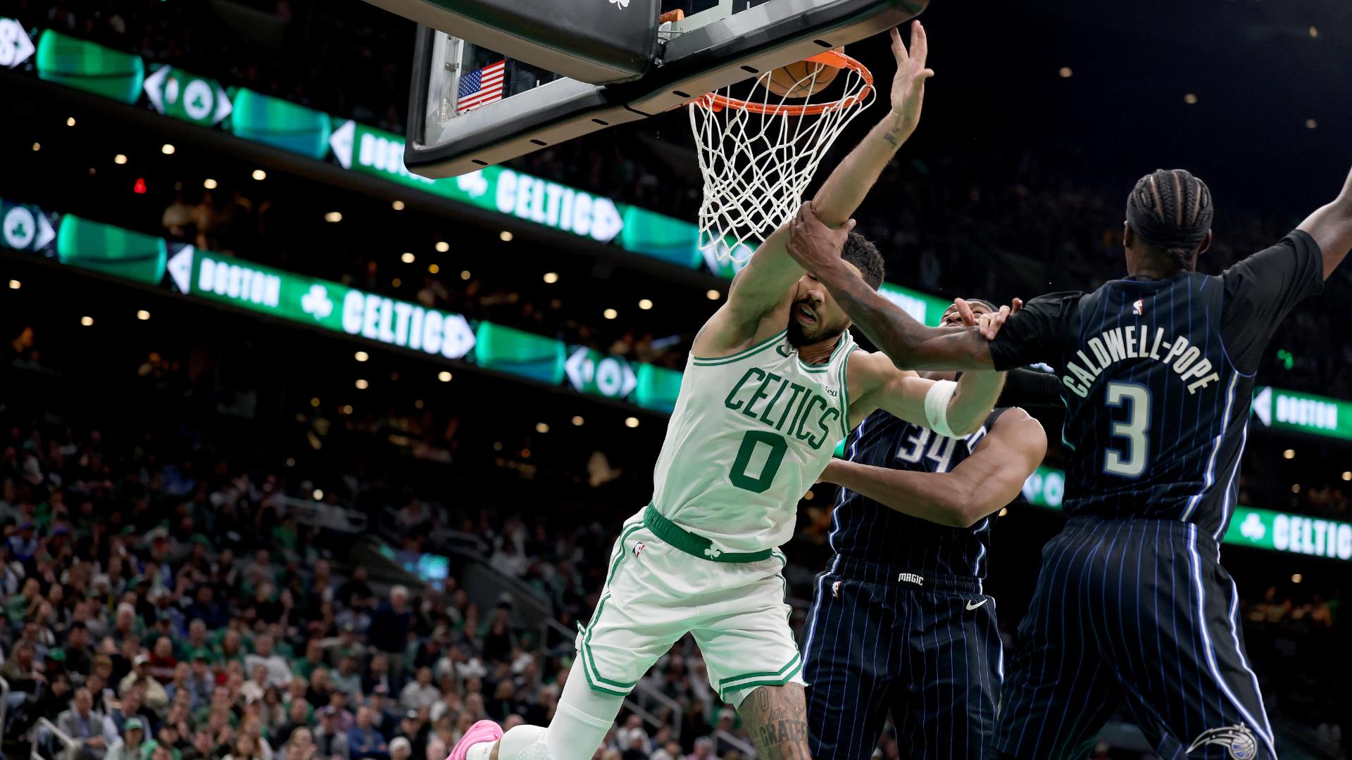 Kentavious Caldwell-Pope commits a flagrant foul on Jayson Tatum, who gets shaken up on the play, but stays in the game.