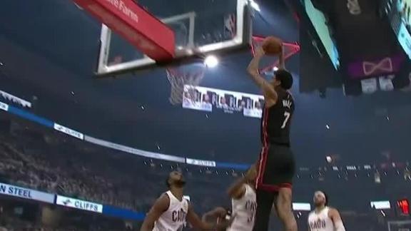 Andrew Wiggins lobs it to Kel'el Ware for a one-handed dunk.