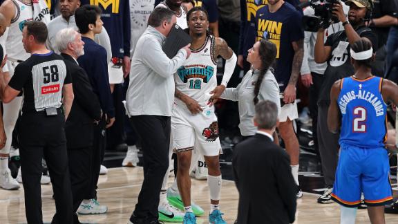 Ja Morant is undercut going for a dunk and falls hard, forcing him to leave the game.