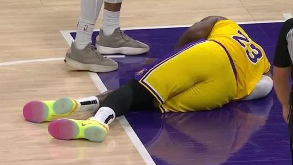 LeBron James collides with Donte DiVincenzo during the fourth quarter of Game 5 and suffers an MCL sprain.