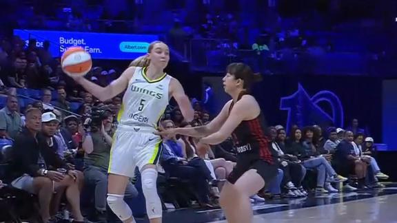 Paige Bueckers lasers dime for a Wings basket