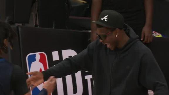 Terrence Shannon Jr. throws down a big dunk and Anthony Edwards loves it.