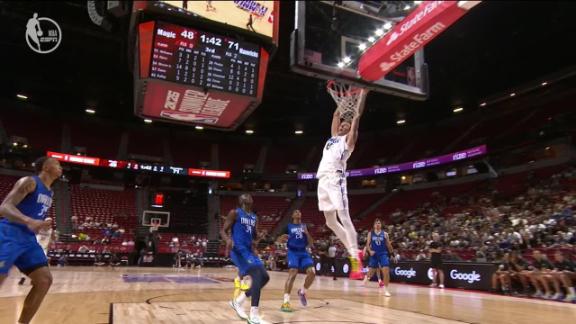 Magic slam home a big-time alley-oop.