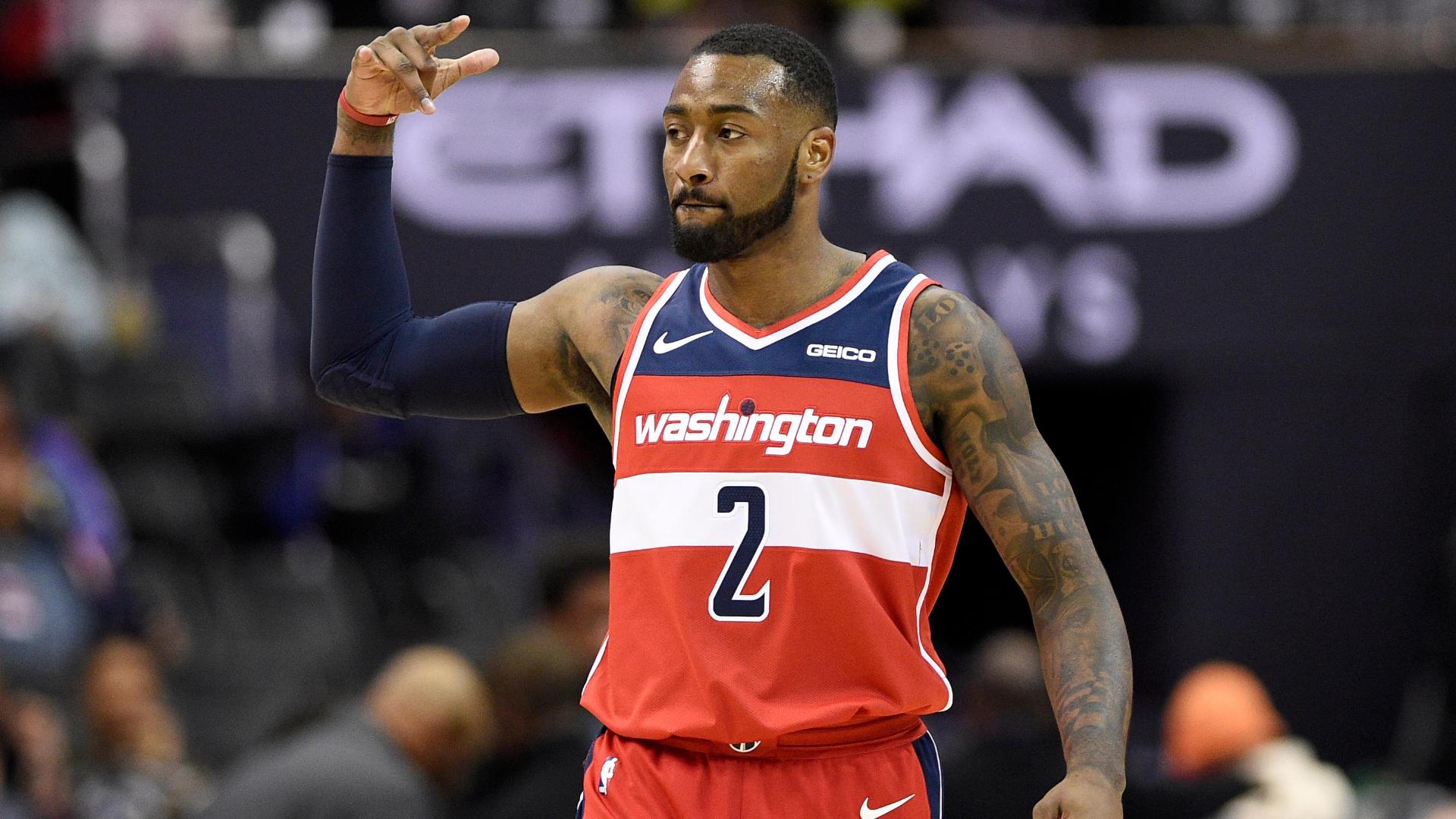 Check out a few of John Wall's top plays of his 11 seasons in the NBA.