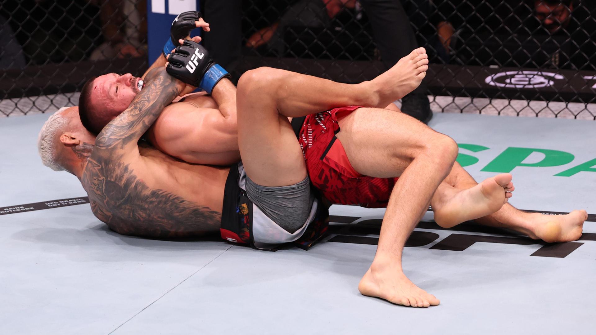 Charles Oliveira wins via submission to thrill home crowd