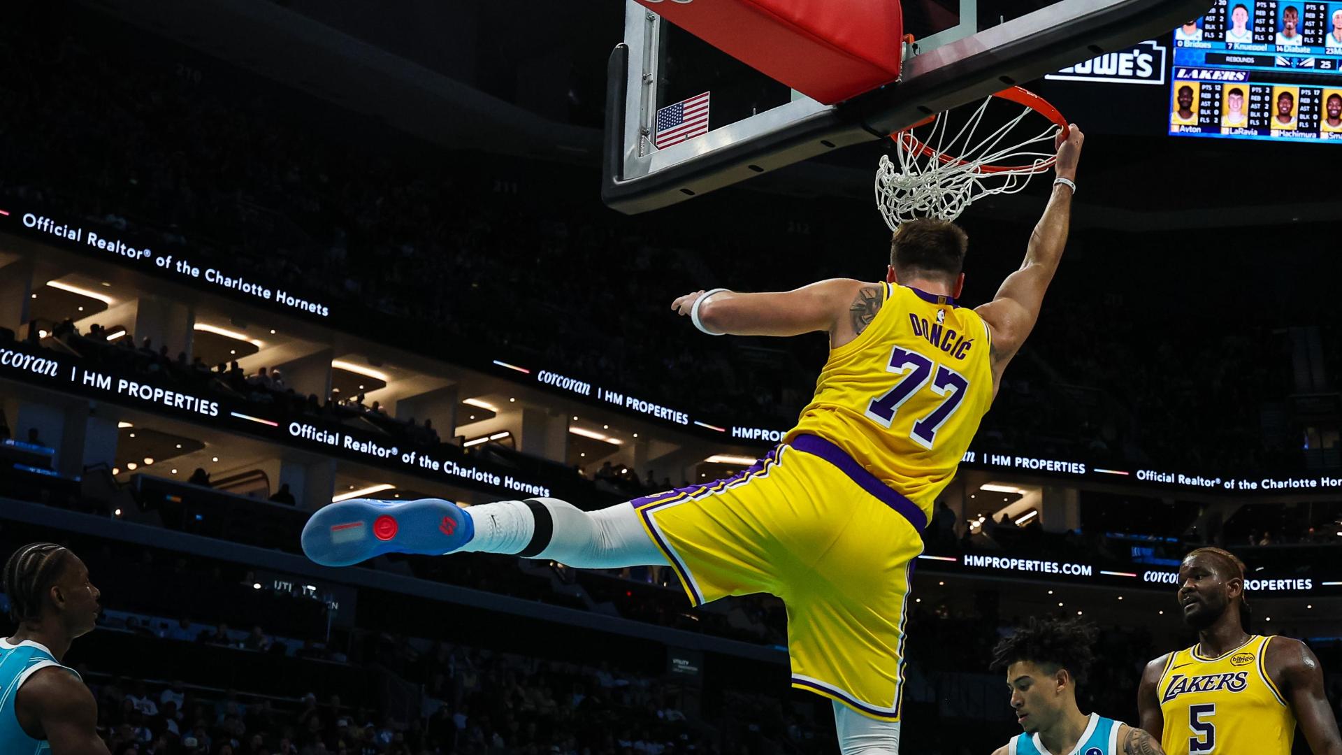 Luka Doncic sees a clear path and elevates for a big dunk.